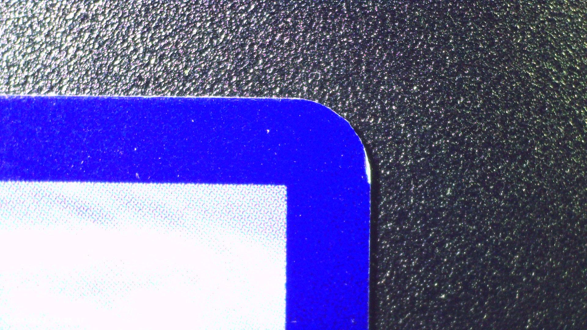 Micro whitening on a card edge